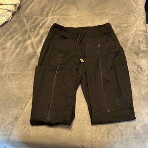 Jaanuu scrub pants, size small. Black wide legged with zippers